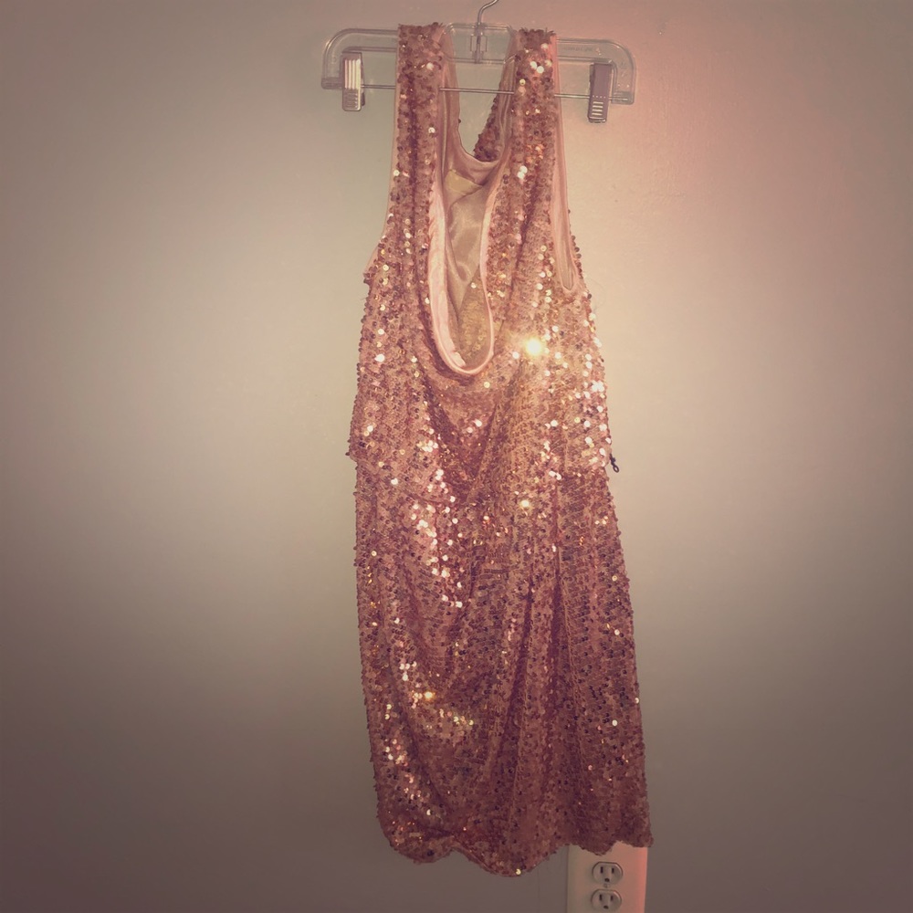 It’s a pink beaded dress